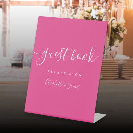 Roze handtekening gastboek met script reclamebord met voetstuk