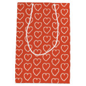 Roze harten op rood medium cadeauzakje (Achterkant)