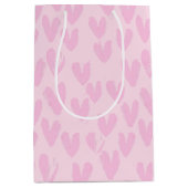 Roze harten op roze medium cadeauzakje (Voorkant)