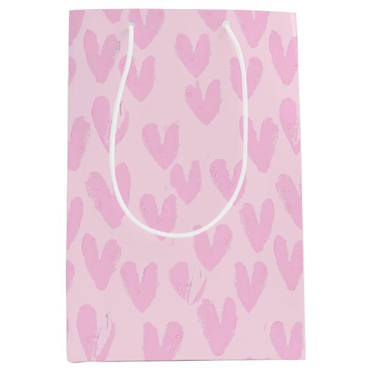 Roze harten op roze medium cadeauzakje (Voorkant)