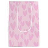 Roze harten op roze medium cadeauzakje (Achterkant)