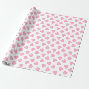 Roze harten op wit cadeaupapier