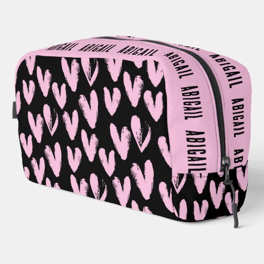 Roze harten op zwart met aangepaste naam toilettasje (Rechterhoek)