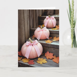 Roze herfstpompoenen en bladeren kaart
