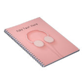 Roze hoofdtelefoon met draden notitieboek (Rechterzijde)