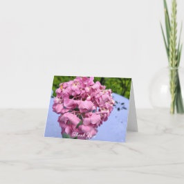 Roze hortensia op een tafel bedankkaart