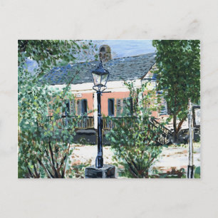 Roze huisje aan de rivier briefkaart