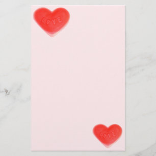 Roze kantoorbenodigdheden, gezoet briefpapier