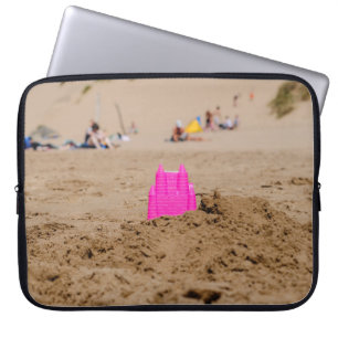 Roze kasteel speelgoed, overdag aan land laptop sleeve