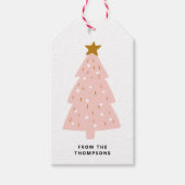 Roze kerstcadeautjes met kerstmis cadeaulabel (Voorkant)