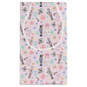 Roze kerstkraker, ontbijtkoek en snoedel  klein cadeauzakje (Achterkant)