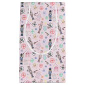 Roze kerstkraker, ontbijtkoek en snoedel  klein cadeauzakje (Voorkant)