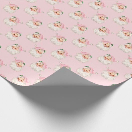  roze kerstman op roze inpakpapier (Hoek)