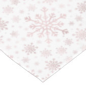 roze kerstsnowflakes op winterwit tafelkleed (Gekanteld)