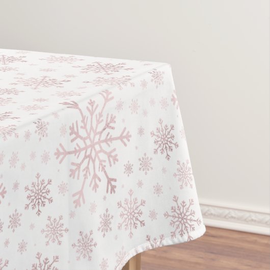 roze kerstsnowflakes op winterwit tafelkleed (Voorbeeld)