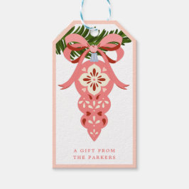 Roze kerstversiering Label met kerstcadeau Cadeaulabel