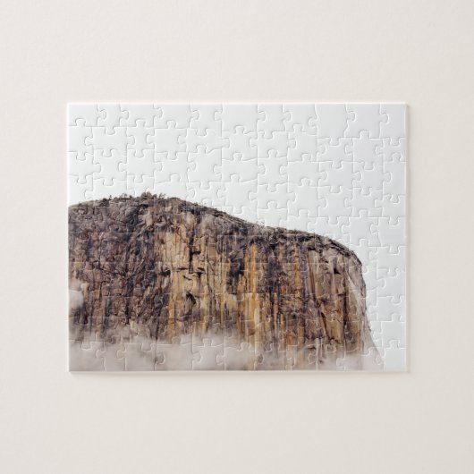 Roze klif stijgend boven wolken legpuzzel (Horizontaal)