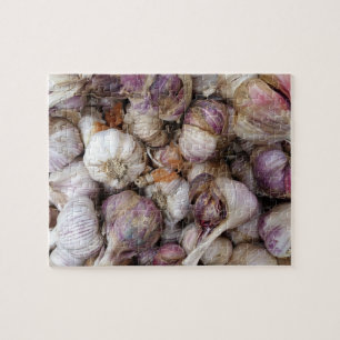 Roze knoflook met volledige knoflookbollen legpuzzel