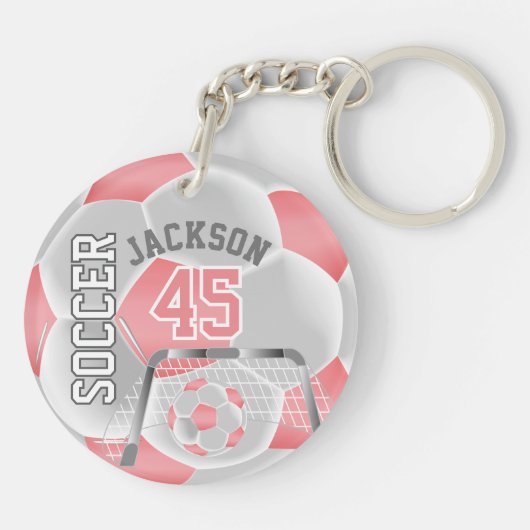 Roze koraal en witte ⚽ sleutelhanger (Achterkant)