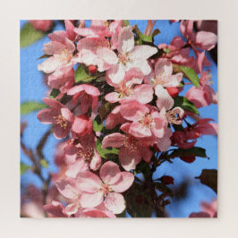 Roze lentesbloesems met blauwe hemel legpuzzel