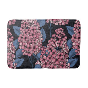Roze lila op donkerblauw badmat