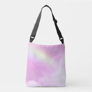 Roze lucht met pluizige wolken en regenboog crossbody tas