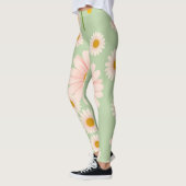 Roze madeliefjes op een lichtgroene achtergrond leggings (Links)