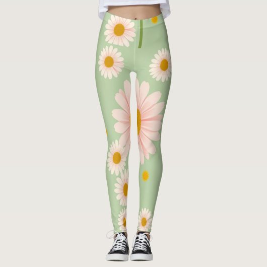 Roze madeliefjes op een lichtgroene achtergrond leggings (Voorkant)