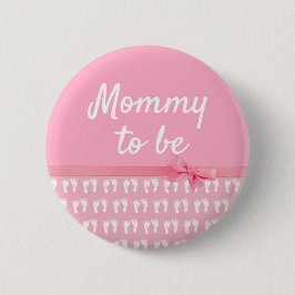 Roze mama om Baby shower Button te voetafdrukken