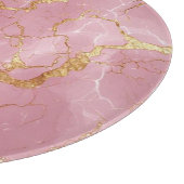 Roze marmeren achtergrond met gouden aders snijplank (Hoek)