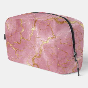 Roze marmeren achtergrond met gouden aders toilettasje
