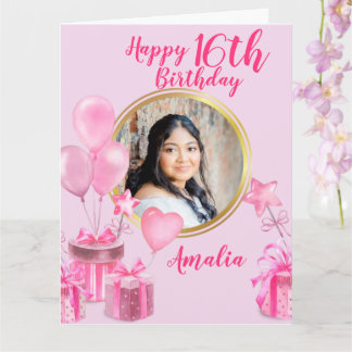 Roze met cadeaus en ballonnen rond foto kaart