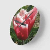 Roze, met de rand gevulde wandklok (Hoek)