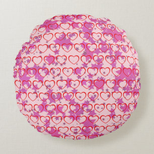 Roze met rode harten rond kussen