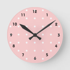 Roze met witte pooldots wandklok
