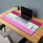 Roze Mint Groene Paarse Strepen Patroonnaam Bureaumat<br><div class="desc">Voeg een persoonlijk tintje toe aan uw werkruimte met de Pink, Mint Green en Paarse Stripes Pattern Name Desk Mat. Met een stijlvol gestreept ontwerp in levendige tinten, biedt deze mat een glad oppervlak voor uw toetsenbord en muis terwijl u uw bureau verbetert met een moderne look. Pas het aan...</div>