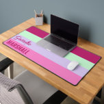 Roze Mint Groene Paarse Strepen Patroonnaam Bureaumat<br><div class="desc">Voeg een persoonlijk tintje toe aan uw werkruimte met de Pink, Mint Green en Paarse Stripes Pattern Name Desk Mat. Met een stijlvol gestreept ontwerp in levendige tinten, biedt deze mat een glad oppervlak voor uw toetsenbord en muis terwijl u uw bureau verbetert met een moderne look. Pas het aan...</div>