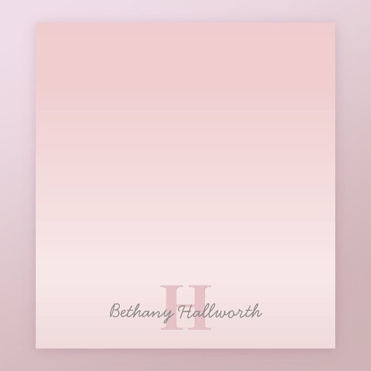 roze monogram en Jouw naam script bevestigen Notitieblok