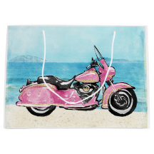 Roze motorfiets op de strand