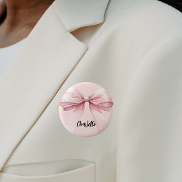 Roze naamkaartje met strik ronde button 5,7 cm