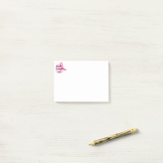 Roze oktober post-it® notes (Op bureau)