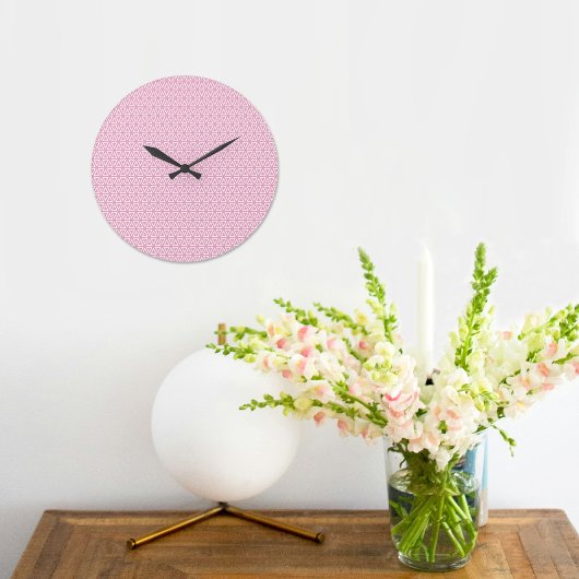 Roze omgekeerde driehoek patroon wandklok