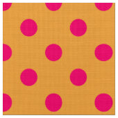 Roze op oranje polka stippen patroonontwerp stof (Close Up)