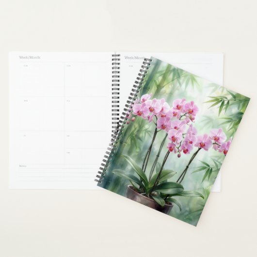 Roze orchideeën op een groene bamboe achtergrond planner (Display)