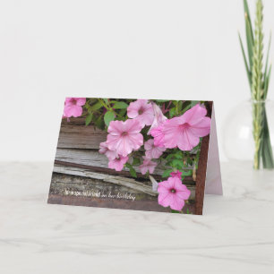 roze petunia op hout voor de verjaardag van Vriend Kaart