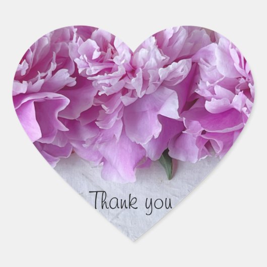 Roze pinda's op rij hart sticker (Voorkant)