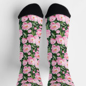 Roze pioenroos bloesems op een bladerige achtergro sokken (Top)