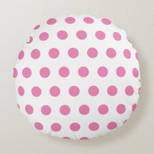 Roze poka dots patroon op witte ronde kussen