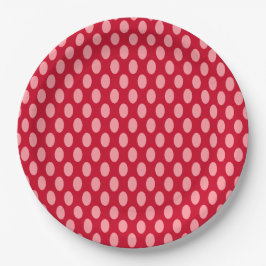 Roze pokadots op rood papieren bordje