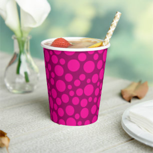 Roze polka stippapier bord papieren bekers